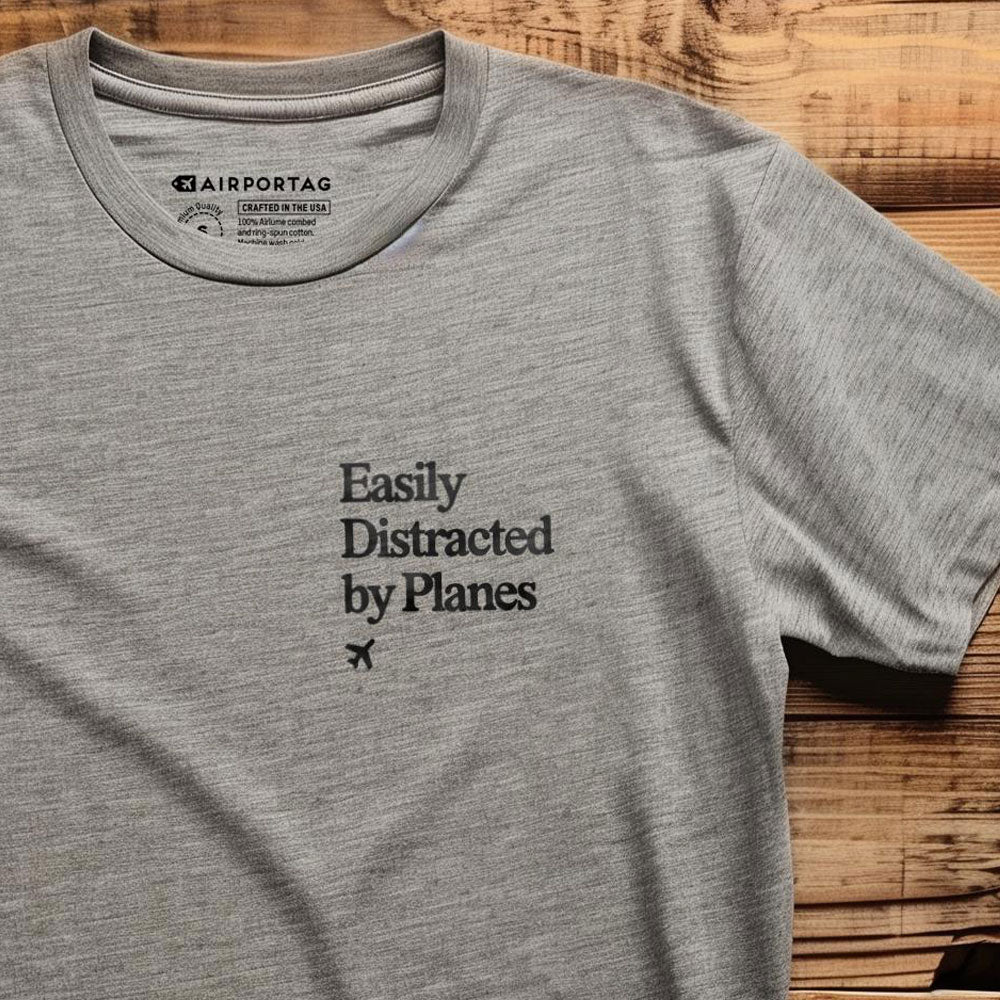 Distracted by Planes - Pocket - T-Shirt