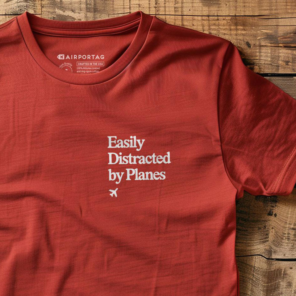 Distracted by Planes - Pocket - T-Shirt