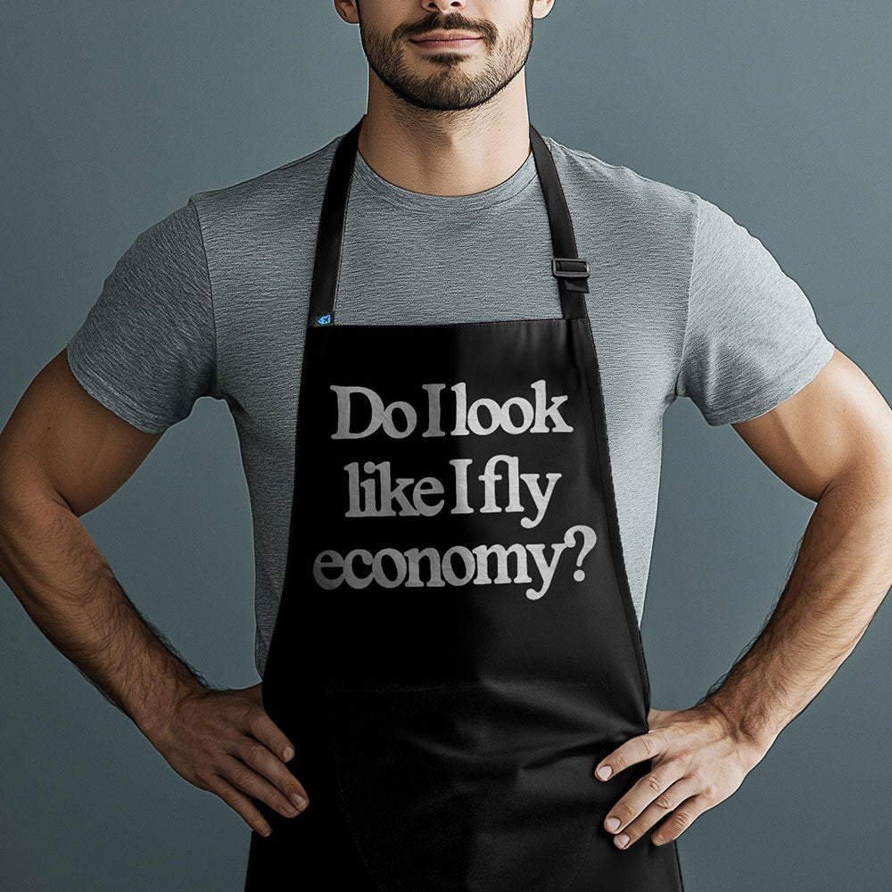 Est-ce que j'ai l'air de voyager en classe économique ? - Tablier de cuisine