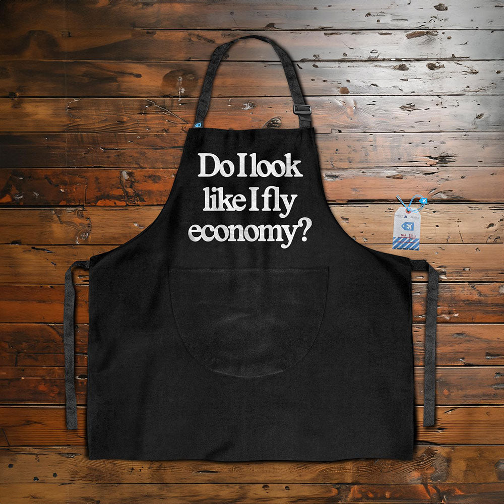 Est-ce que j'ai l'air de voyager en classe économique ? - Tablier de cuisine