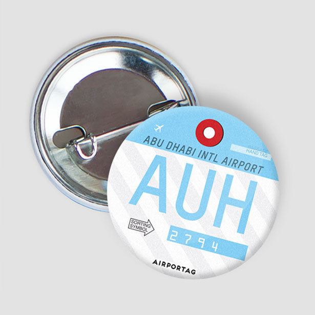 AUH - Button - Airportag