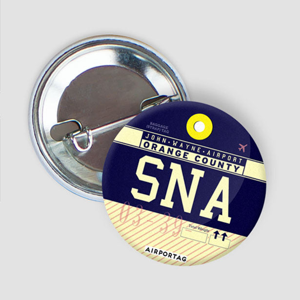 SNA - Button - Airportag
