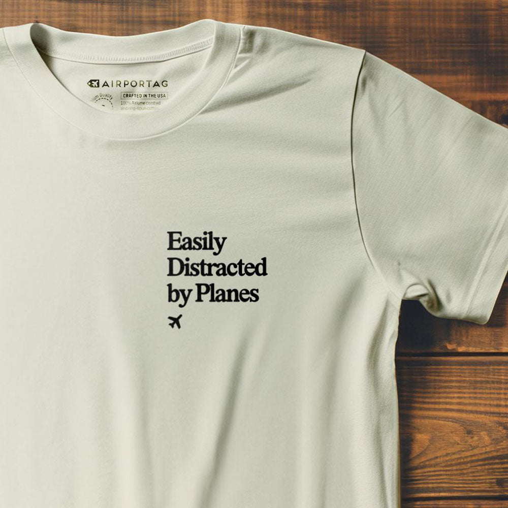 Distracted by Planes - Pocket - T-Shirt