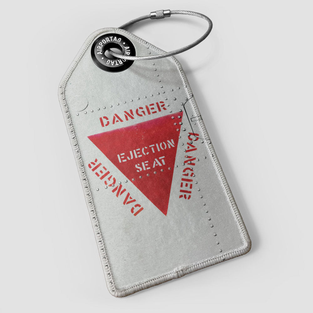 Ejection - Luggage Tag