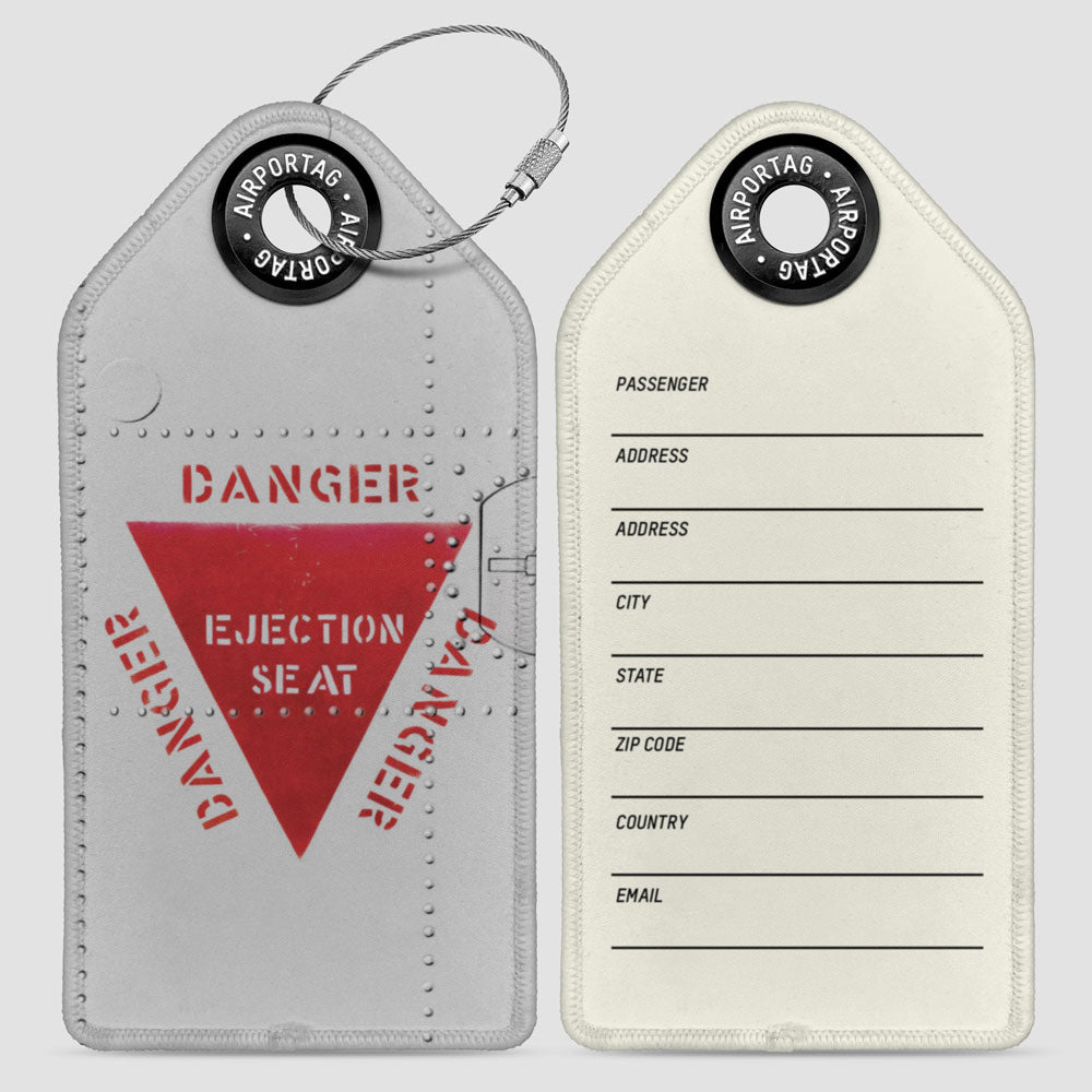 Ejection - Luggage Tag