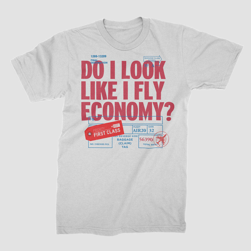Est-ce que j'ai l'air de voyager en classe économique ? Étiquette - T-Shirt
