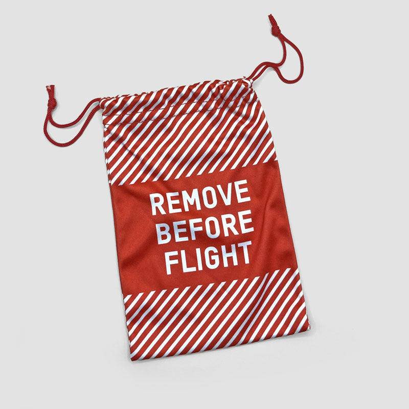 Remove Before Flight - Small Drawstring Bag