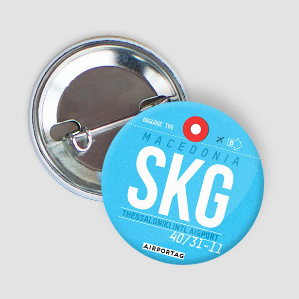 SKG - Button - Airportag