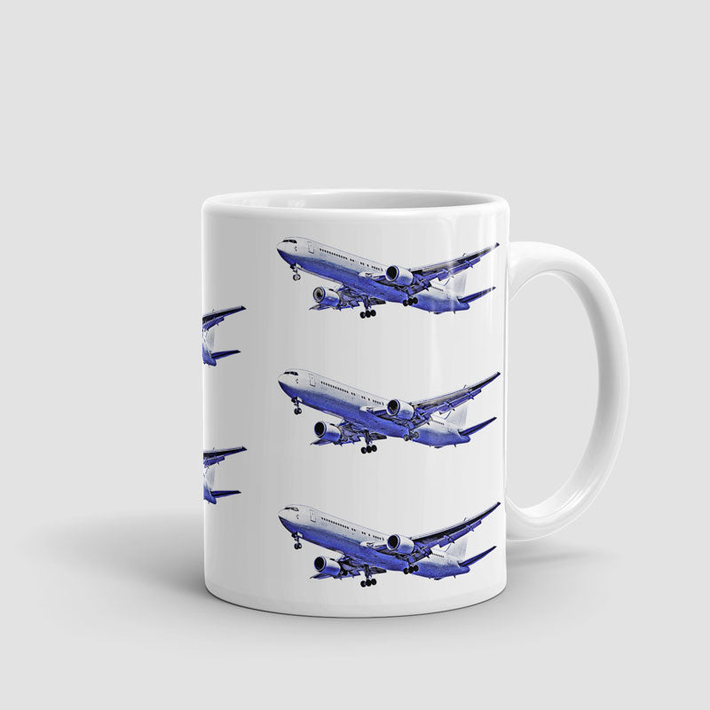 離陸する飛行機 青と白 - マグカップ