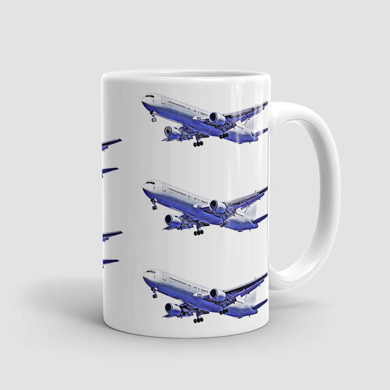 離陸する飛行機 青と白 - マグカップ